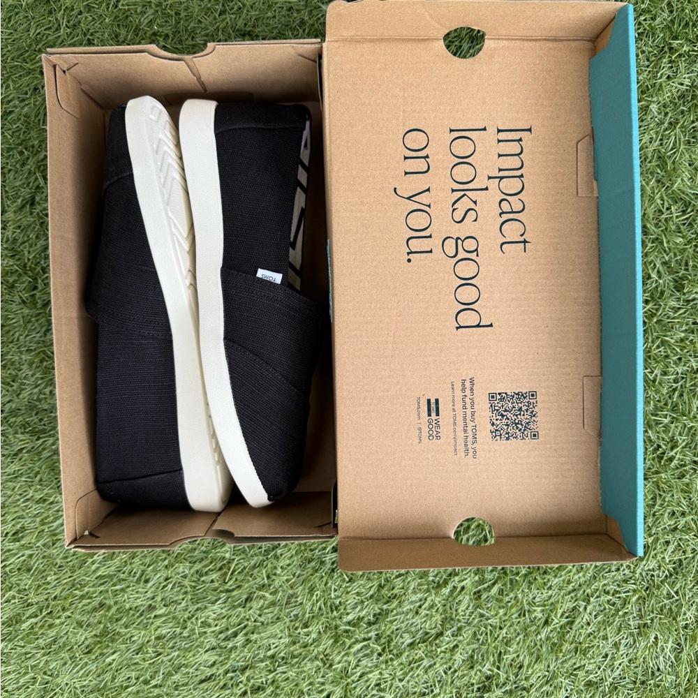 Toms Black and White Slip-On Loafers